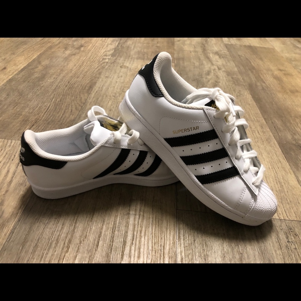 Black and white shell toe adidas